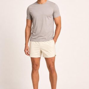 Men's Cream Running Shorts worn with an adult model