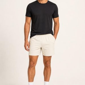 Men's Cream Court Shorts worn with an adult model