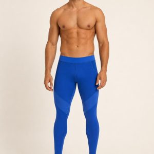 Men's Cobalt Tonal Panel Compression Pants worn with an adult model