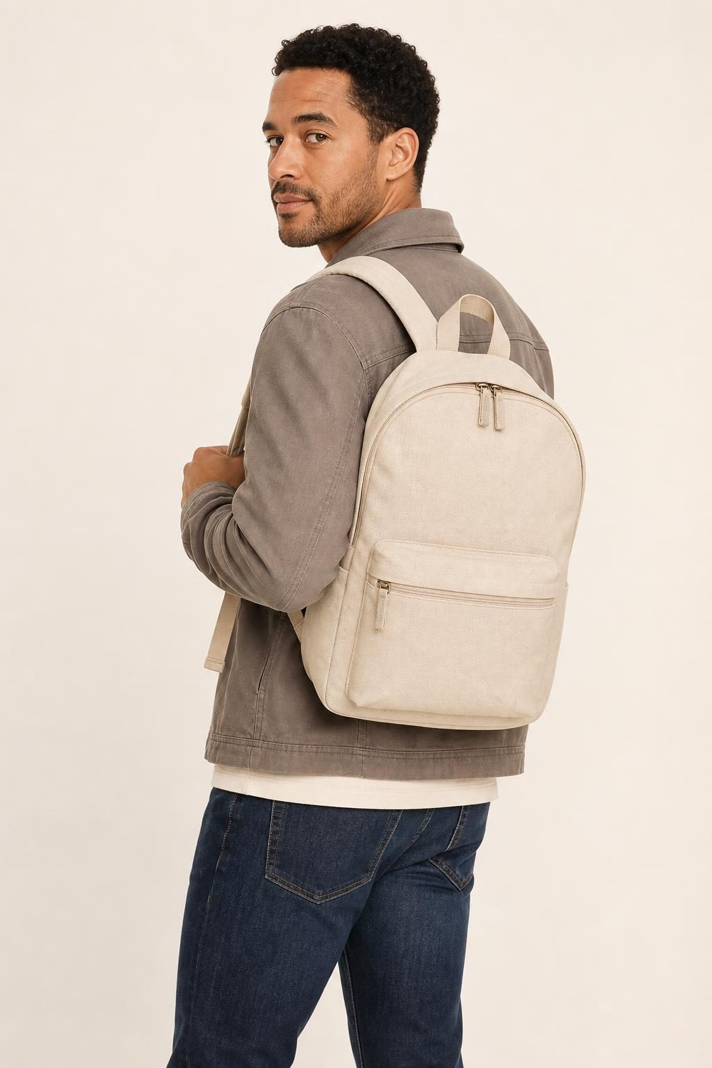 Men's Cream Backpack shown with an adult model