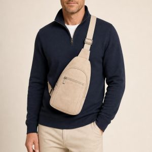 Men's Cream Sling Bag shown with an adult model