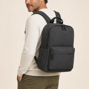 Men's Charcoal Tonal Texture Backpack shown with an adult model