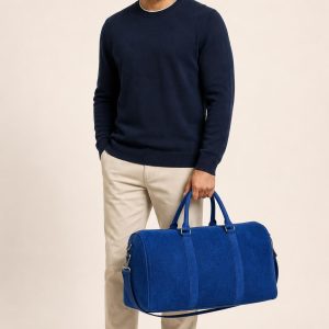 Men's Cobalt Tonal Texture Weekender Bag shown with an adult model