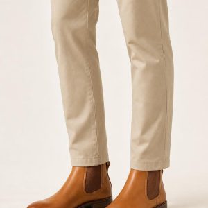 Men's Camel Two-tone Panel Chelsea Boot worn with an adult model