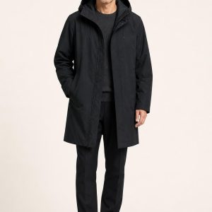 Black Technical Raincoat worn with an adult model