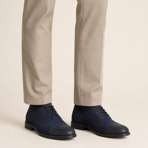 Men's Navy Two-tone Panel Cap-Toe Derby worn with an adult model