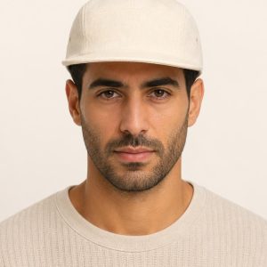 Men's Ivory Five-Panel Cap worn with an adult model