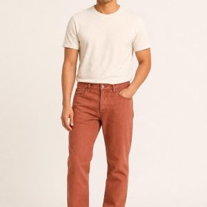 Men's Terracotta Relaxed Jeans worn with an adult model