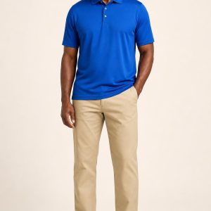 Men's Cobalt Performance Polo worn with an adult model
