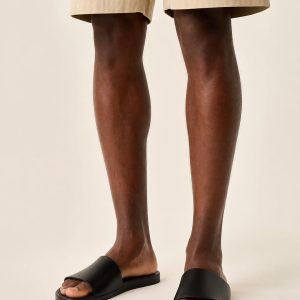 Men's Black Slide Sandal worn with an adult model