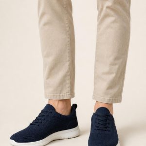 Men's Navy Low-Top Sneaker worn with an adult model