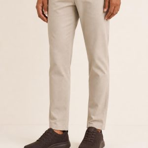 Men's Chocolate Runner Sneaker worn with an adult model