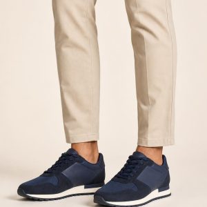 Men's Navy Two-tone Panel Runner Sneaker worn with an adult model