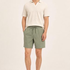 Men's Sage Tonal Texture Linen Shorts worn with an adult model