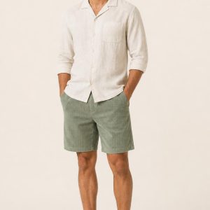 Men's Sage Tonal Texture Corduroy Shorts worn with an adult model