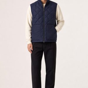 Men's Indigo Quilted Vest worn with an adult model