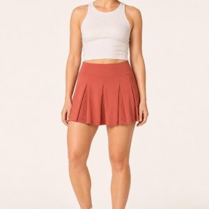 Women's Terracotta Tennis Skirt worn with an adult model