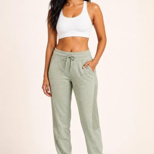 Women's Sage Subtle Heather Studio Joggers worn with an adult model