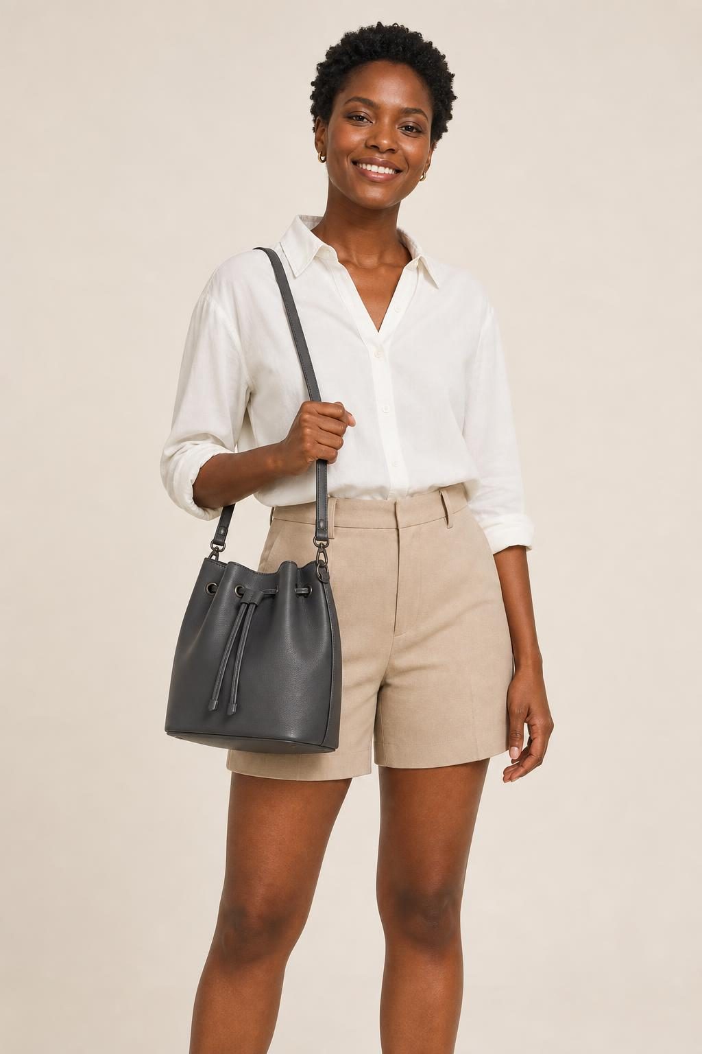 Women's Charcoal Bucket Bag shown with an adult model
