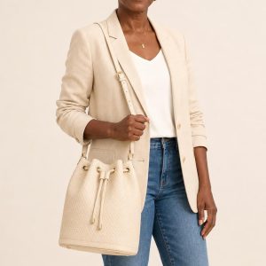 Women's Cream Tonal Texture Bucket Bag shown with an adult model