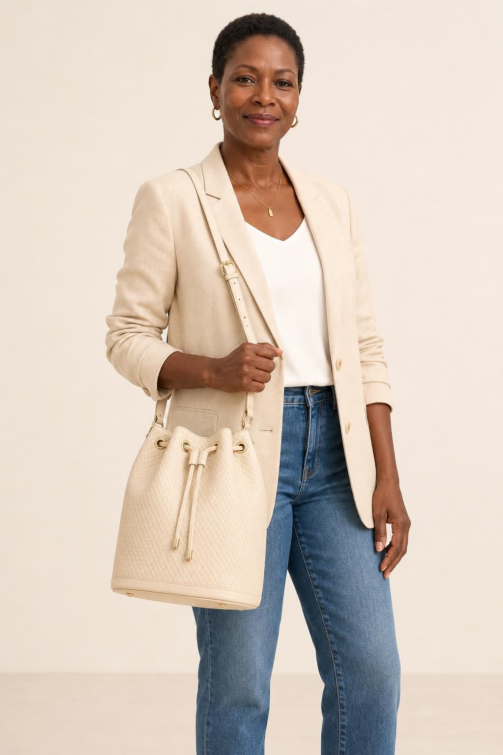 Women's Cream Tonal Texture Bucket Bag shown with an adult model