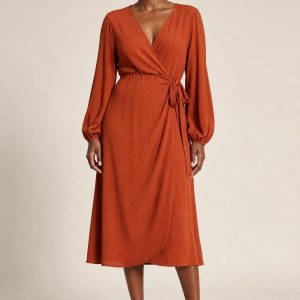 Rust Midi Wrap Dress worn by an adult model