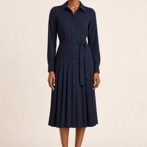Navy Pleated Shirt Dress worn by an adult model