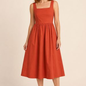 Terracotta Cotton Poplin Sundress worn by an adult model
