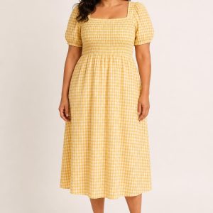 Sunflower Gingham Smocked Dress worn by an adult model