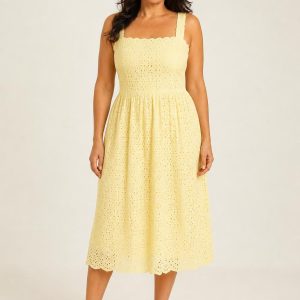 Lemon Broderie Sundress worn by an adult model