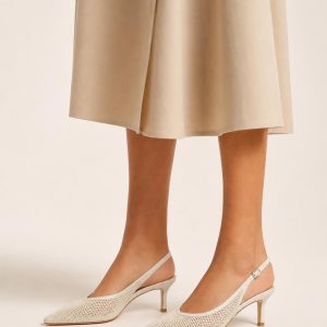 Women's Cream Slingback Heel worn with an adult model