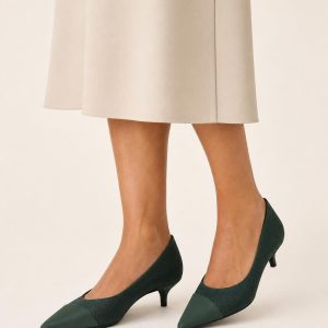 Women's Forest Two-tone Panel Kitten-Heel Pump worn with an adult model