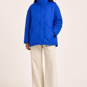 Women's Cobalt Quilted Jacket worn with an adult model