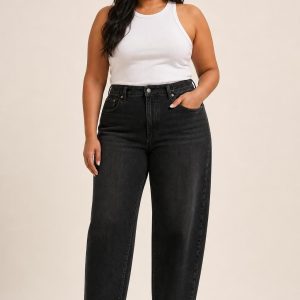 Women's Black Faded Wash Barrel Jeans worn with an adult model