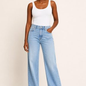 Women's Sky Faded Wash Relaxed Jeans worn with an adult model