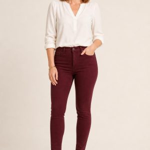 Women's Burgundy Clean Wash Skinny Jeans worn with an adult model