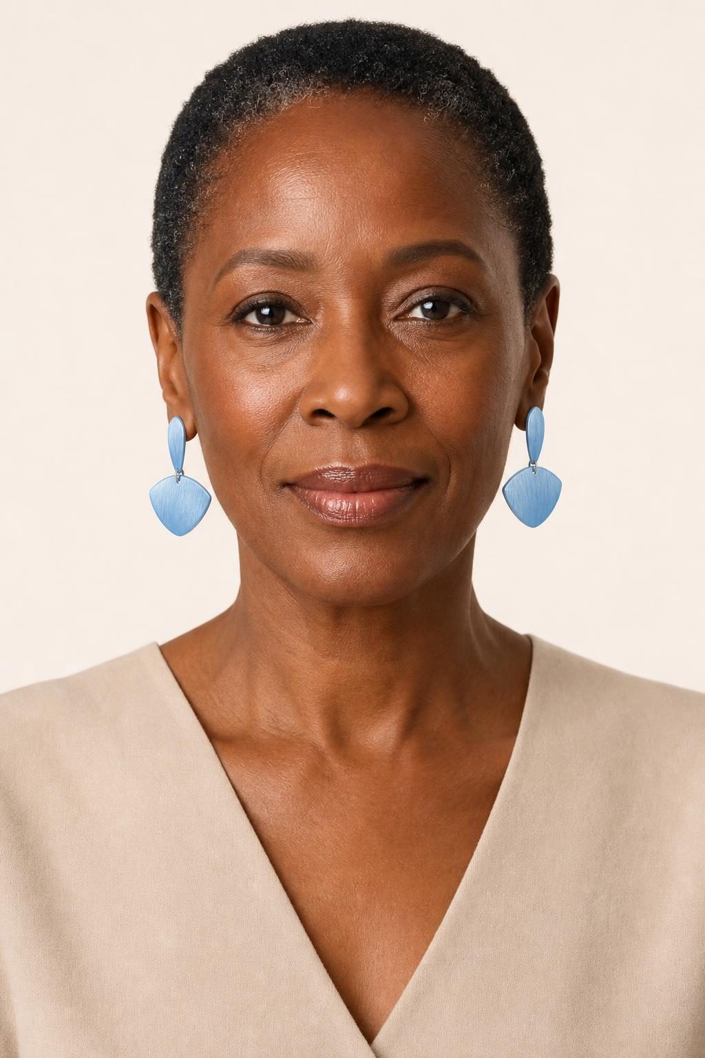 Women's Sky Sculpted Earrings worn with an adult model