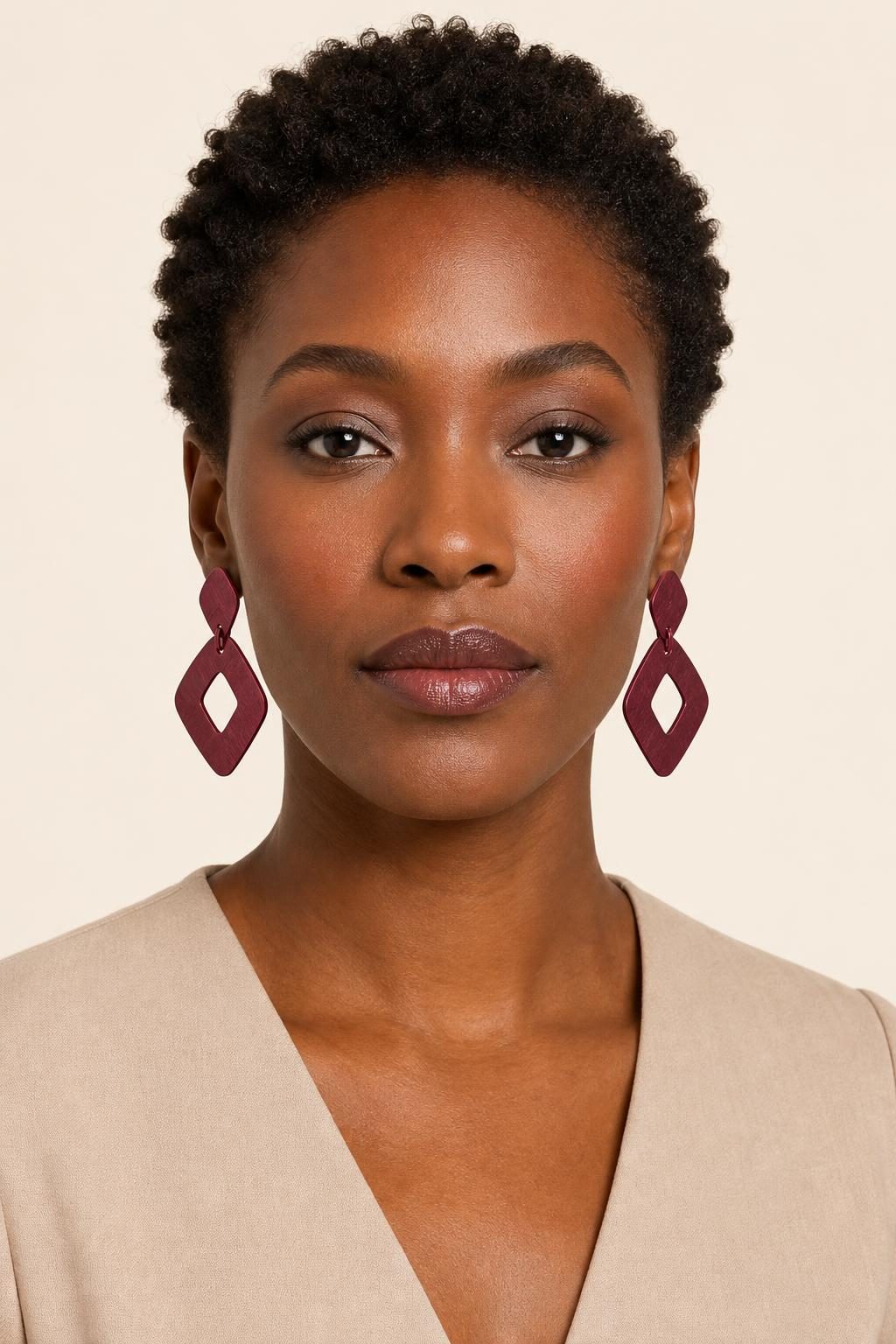 Women's Burgundy Geometric Earrings worn with an adult model