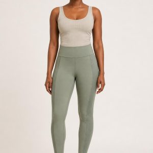Women's Sage Tonal Panel Ankle Leggings worn with an adult model
