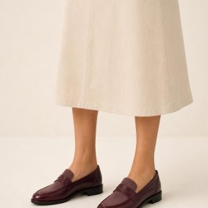 Women's Burgundy Two-tone Panel Penny Loafer worn with an adult model