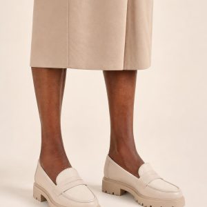 Women's Oatmeal Two-tone Panel Lug Loafer worn with an adult model
