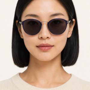 Women's Indigo Round Sunglasses worn with an adult model
