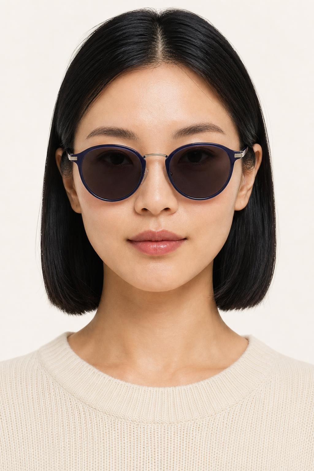Women's Indigo Round Sunglasses worn with an adult model
