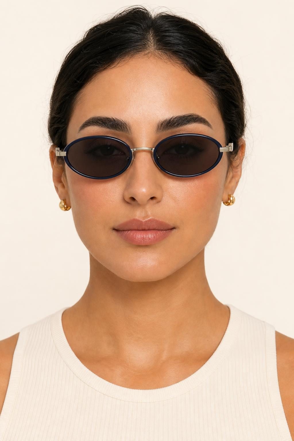 Women's Indigo Oval Sunglasses worn with an adult model