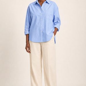 Women's Sky Oxford Shirt worn with an adult model