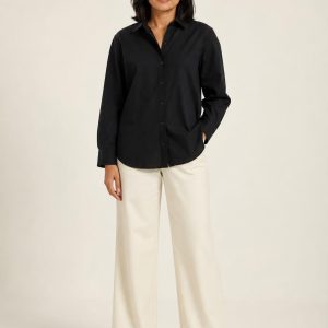 Women's Black Poplin Shirt worn with an adult model