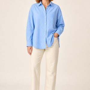 Women's Sky Tonal Texture Poplin Shirt worn with an adult model