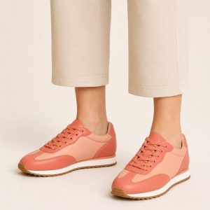 Women's Coral Two-tone Panel Retro Sneaker worn with an adult model