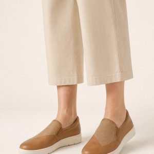Women's Camel Two-tone Panel Slip-On Sneaker worn with an adult model