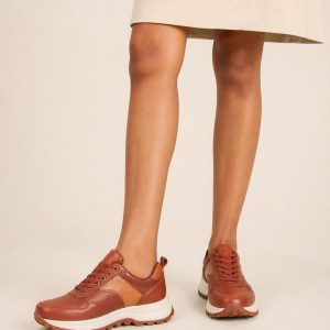 Women's Rust Two-tone Panel Trail Sneaker worn with an adult model